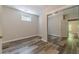 A simple bedroom with a mirrored closet and light-filled ambiance at 776 Myerston Ct, Lawrenceville, GA 30044