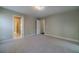 Spacious bedroom featuring neutral walls and plush carpeting for a cozy and inviting atmosphere at 776 Myerston Ct, Lawrenceville, GA 30044
