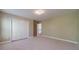 A bedroom featuring carpet floors, natural light, and a closet at 776 Myerston Ct, Lawrenceville, GA 30044
