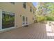 Large wooden deck connects to the house with large picture window and french doors at 776 Myerston Ct, Lawrenceville, GA 30044