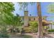 Two story home with large deck and mature shade trees around the perimeter at 776 Myerston Ct, Lawrenceville, GA 30044