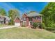 Lovely two-story brick home with landscaped front yard, and attached two car garage at 776 Myerston Ct, Lawrenceville, GA 30044