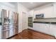 A modern kitchen featuring stainless steel appliances and sleek countertops at 776 Myerston Ct, Lawrenceville, GA 30044