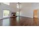Bright living room with a fireplace and large windows providing natural light and an outdoor view at 776 Myerston Ct, Lawrenceville, GA 30044