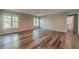 A spacious living room with lots of light shining through the windows at 776 Myerston Ct, Lawrenceville, GA 30044