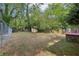 Spacious, fenced backyard offers ample space for outdoor activities at 2081 Beecher Sw Rd, Atlanta, GA 30311