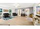 Bright living room features wood-look flooring and a comfortable seating area at 2081 Beecher Sw Rd, Atlanta, GA 30311