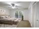 Spacious bedroom with large window, ceiling fan, and ample closet space at 4036 Winding Valley Se Dr, Smyrna, GA 30082