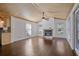 Bright living room with hardwood floors, a fireplace, and large windows offering lots of natural light at 4036 Winding Valley Se Dr, Smyrna, GA 30082