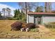 Charming outbuilding in a landscaped backyard setting, ideal for a studio or workshop at 4036 Winding Valley Se Dr, Smyrna, GA 30082