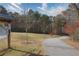 Picturesque walking path leading into a beautiful wooded area and fall foliage at 4036 Winding Valley Se Dr, Smyrna, GA 30082