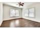 Cozy bedroom with gleaming hardwood floors and plenty of natural light at 934 Hope Dr, Atlanta, GA 30310