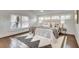 Comfortable main bedroom with area rug, windows, and bedside tables at 934 Hope Dr, Atlanta, GA 30310