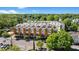 Contemporary multi-story building with sleek design, multiple balconies, and expansive windows, surrounded by lush greenery at 1307 Glenwood Se Ave, Atlanta, GA 30316