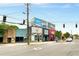 Street-level view of mixed-use buildings with vibrant storefronts and street parking at 1307 Glenwood Se Ave, Atlanta, GA 30316