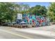Exterior view of a restaurant building displaying colorful graffiti art, capturing an eclectic vibe at 1307 Glenwood Se Ave, Atlanta, GA 30316