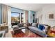 Bright living room with stylish seating, large windows, and chic decor at 1307 Glenwood Se Ave, Atlanta, GA 30316