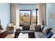 Bright living room boasts a large window and comfortable seating with decor at 1307 Glenwood Se Ave, Atlanta, GA 30316