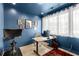 Cozy home office with a view and modern decor including stylish lighting, desk, and peloton at 1307 Glenwood Se Ave, Atlanta, GA 30316