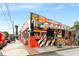 Restaurant exterior featuring colorful graffiti art, creating a lively and inviting atmosphere at 1307 Glenwood Se Ave, Atlanta, GA 30316