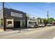 Street view of a commercial area with various storefronts, showcasing diverse businesses and parking spaces at 1307 Glenwood Se Ave, Atlanta, GA 30316
