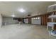 Spacious three car garage offering ample storage and parking with modern lighting at 150 Hartwood Dr, Woodstock, GA 30189