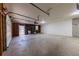 Three car garage, with ample storage and parking with modern lighting at 150 Hartwood Dr, Woodstock, GA 30189