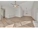 Spacious living room with modern floors, high ceilings, and natural light at 150 Hartwood Dr, Woodstock, GA 30189