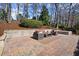 Backyard with a stone patio and outdoor furniture at 2344 Sagamore Hills Dr, Decatur, GA 30033