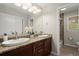 Bathroom featuring a double vanity with granite countertops and modern fixtures at 2344 Sagamore Hills Dr, Decatur, GA 30033