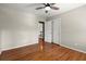 Bedroom with hardwood floors, neutral walls, a ceiling fan and closet at 2344 Sagamore Hills Dr, Decatur, GA 30033