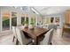 Bright dining room with large windows and access to the backyard at 2344 Sagamore Hills Dr, Decatur, GA 30033