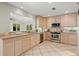 Charming kitchen featuring tile floor, stainless steel appliances, and stone countertops at 2344 Sagamore Hills Dr, Decatur, GA 30033