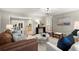 Open-concept living room with hardwood floors and plenty of natural light at 2344 Sagamore Hills Dr, Decatur, GA 30033