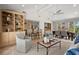 Open-concept living area featuring a dining space and a large bookcase at 2344 Sagamore Hills Dr, Decatur, GA 30033
