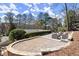 Inviting outdoor stone patio area with comfortable seating perfect for entertaining at 2344 Sagamore Hills Dr, Decatur, GA 30033