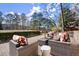 Inviting patio features comfortable outdoor seating with decorative cushions and a small table at 2344 Sagamore Hills Dr, Decatur, GA 30033