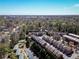 Scenic aerial view showcases the townhome community amidst lush trees and city skyline at 24 Rockland Pl, Decatur, GA 30030