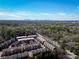 Expansive aerial view showing townhomes surrounded by lush greenery and the city skyline at 24 Rockland Pl, Decatur, GA 30030