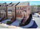 A beautiful aerial view showing a meticulously landscaped townhome community at 24 Rockland Pl, Decatur, GA 30030