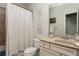 Well-maintained bathroom with single vanity, shower-tub combo, and a neutral color scheme at 24 Rockland Pl, Decatur, GA 30030