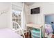 Stylish bedroom features a small desk, hardwood floors and bright natural light at 24 Rockland Pl, Decatur, GA 30030