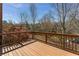 A wooden deck featuring lovely views with natural light and beautiful trees surrounding the area at 24 Rockland Pl, Decatur, GA 30030