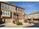 Beautiful townhome with brick and stone exterior and well manicured landscaping at 24 Rockland Pl, Decatur, GA 30030