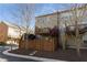 Charming multi-story townhome with a cozy deck, fenced yard, and mature trees providing shade and privacy at 24 Rockland Pl, Decatur, GA 30030