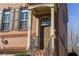 Charming brick home featuring an inviting front entry with a classic brown door and decorative window above at 24 Rockland Pl, Decatur, GA 30030