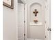 Bright hallway features arched niche with decor, and neutral paint creating a warm, inviting atmosphere at 24 Rockland Pl, Decatur, GA 30030