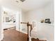 Bright hallway with hardwood floors leading to a bedroom, enhanced by natural light at 24 Rockland Pl, Decatur, GA 30030