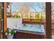 Enjoy the outdoor hot tub, perfect for relaxation on the private stone patio with a wooden privacy fence at 24 Rockland Pl, Decatur, GA 30030