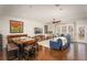 Spacious living room with hardwood floors, a ceiling fan, comfortable seating, and natural light at 24 Rockland Pl, Decatur, GA 30030